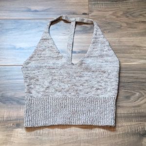 Cute tank crop top with the back cut out.